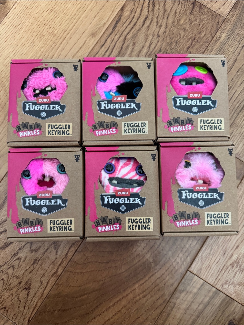 Complete set of Zuru Fuggler Baby Pinkles Keyring Pink Plush Monster (Set of 6)